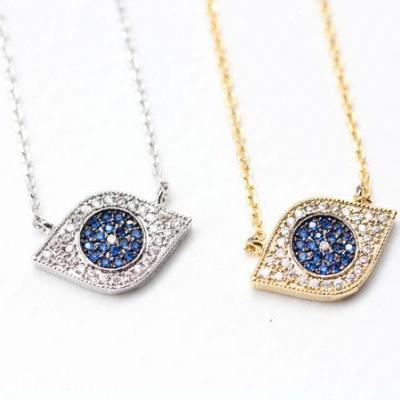 EVIL EYE Pendant Necklace detailed in Swarovski Blue setting Gold / Silver(925 sterling silver / plated over Brass)