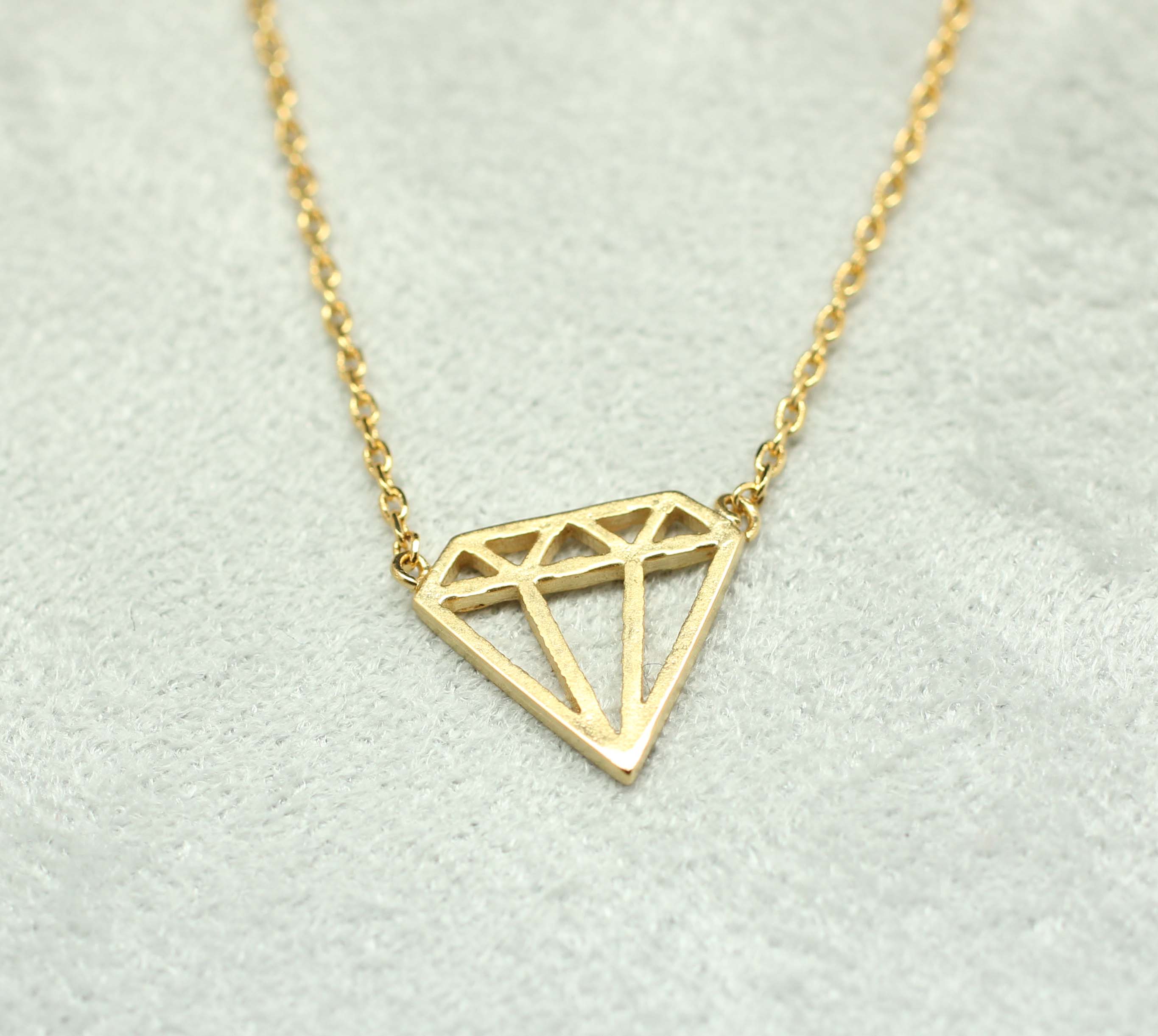 gold diamond shape pendant